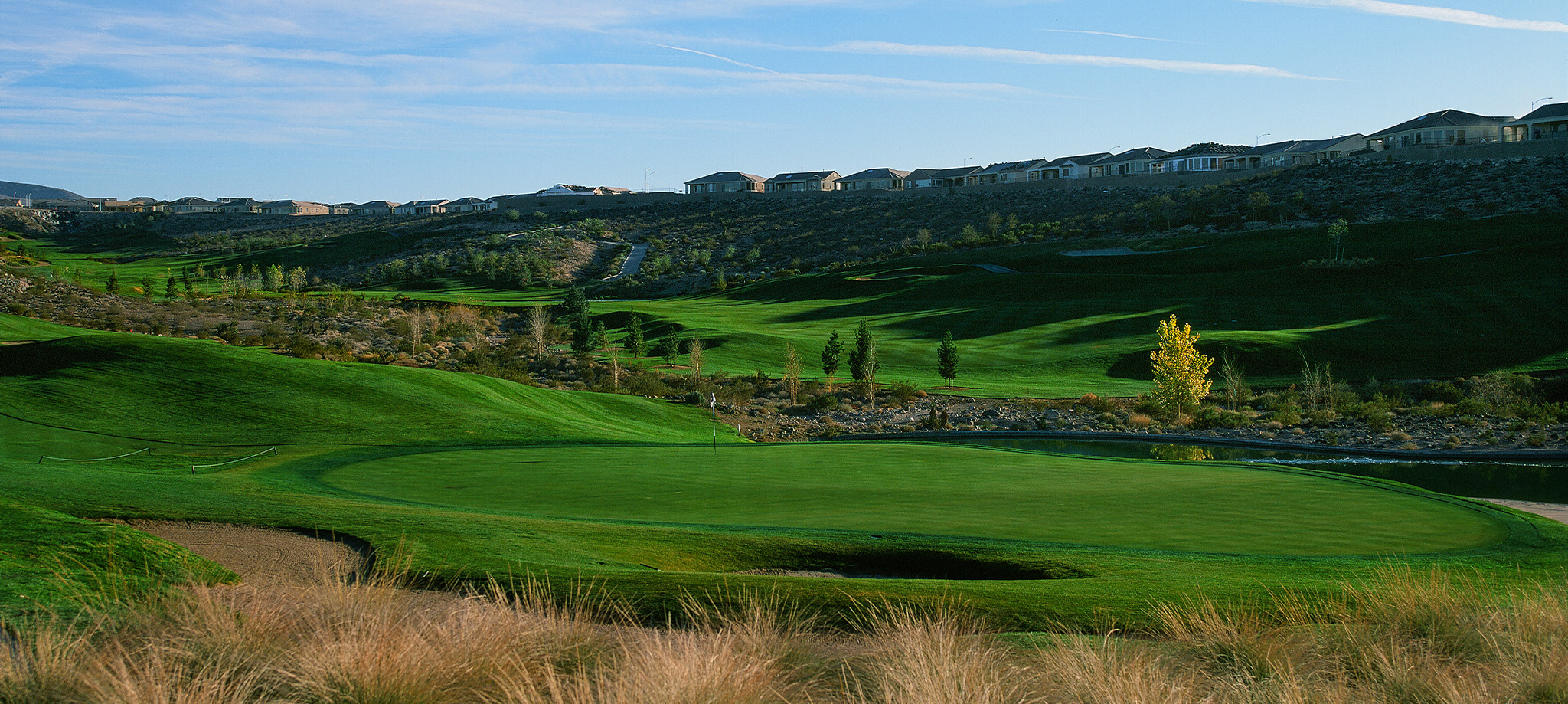 The Revere Golf Club fairways, desert terrain and Sun City Anthem ridge homes